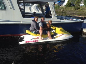 Dog driving a jet ski‏